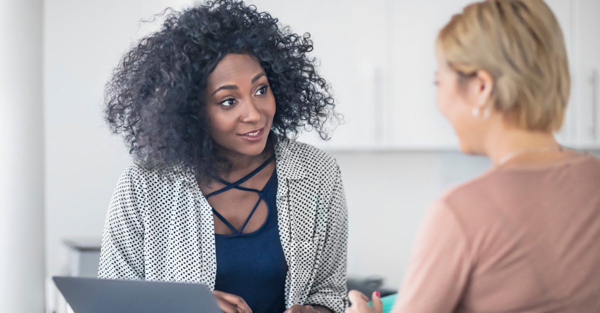 businesswoman-with-her-colleague-working-together businesswoman-with-her-colleague-working-together