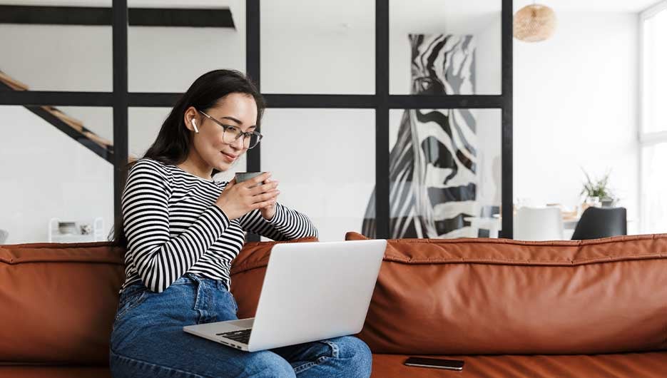 woman sitting at window